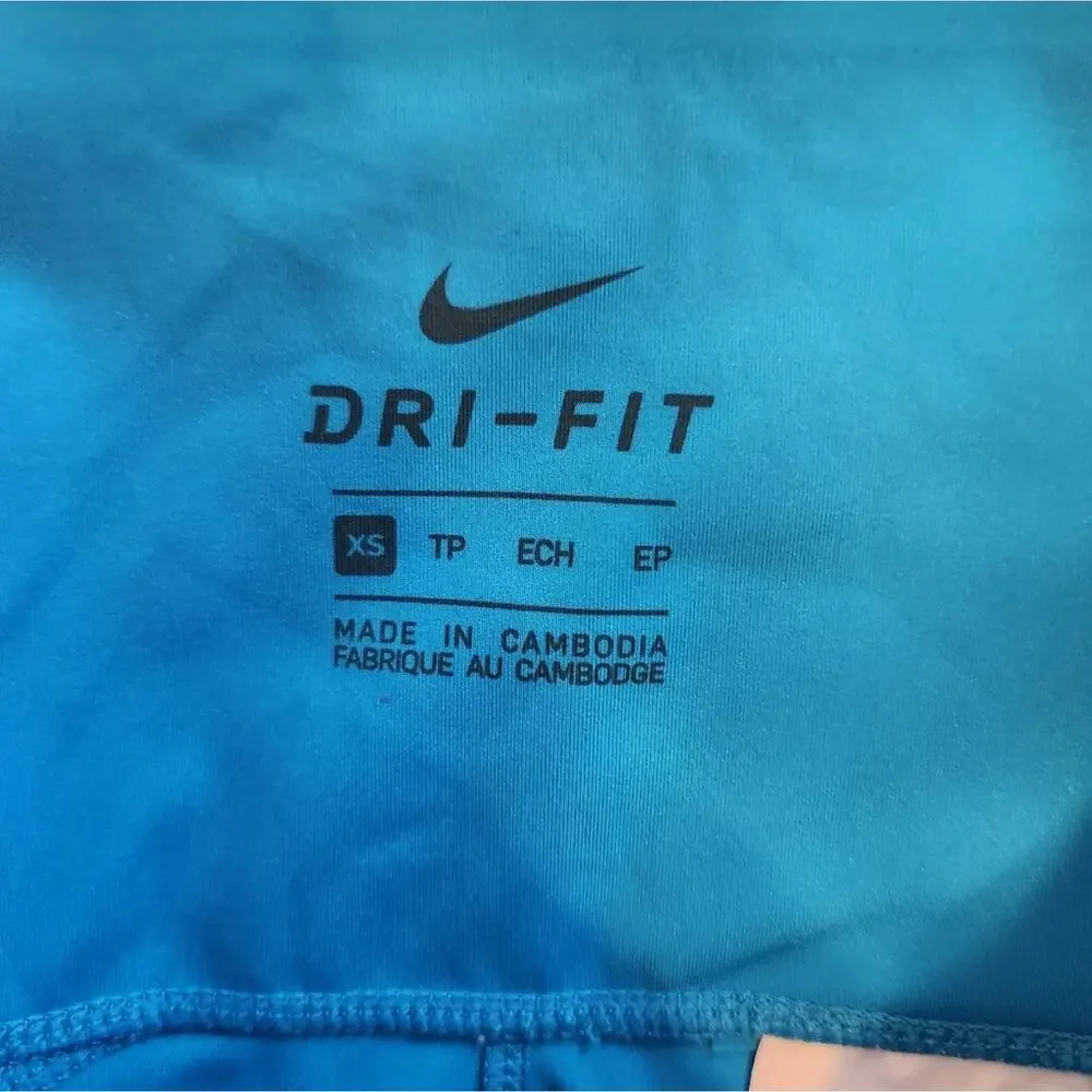 NIKE Dri fit Bungee Detail workout leggings In Aqua Blue XS